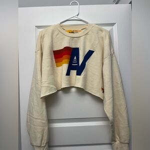 Cream Cropped Sweatshirt with Colorful Logo